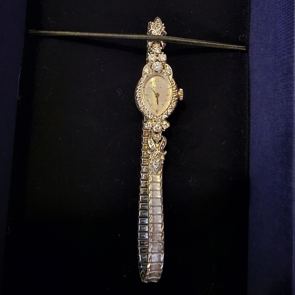 Bulova 14k white gold diamond watch - 14.53 grams.